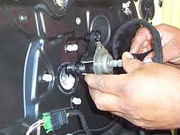 removing manual crank mechanism from door