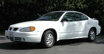 Diagnosing and replacing a power window regulator & motor in a Pontiac